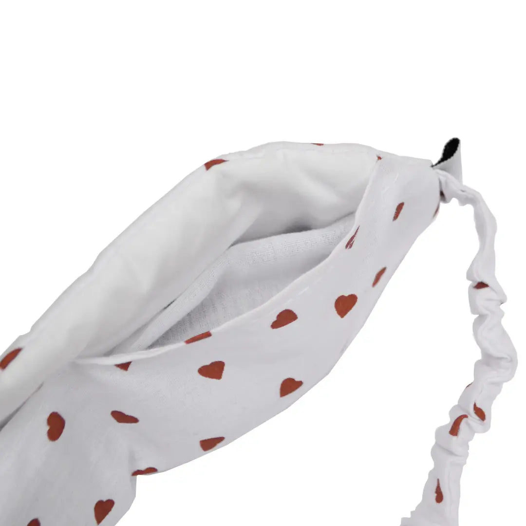 Intérieur d'un masque chauffant réfrigérant pour les yeux - motifs coeurs rouges